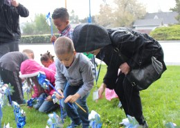 PPS Vestal School Elementary Kindergarten students brave the rain to plant pinwheels in support of Child Abuse Prevention Month.